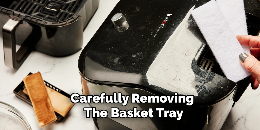 
Carefully Removing 
The Basket Tray