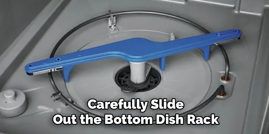 Carefully Slide Out the Bottom Dish Rack