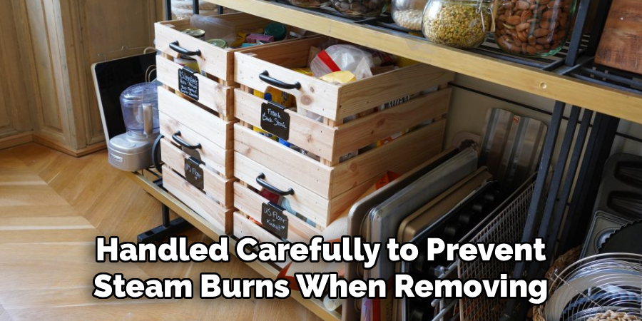 Handled Carefully to Prevent Steam Burns When Removing