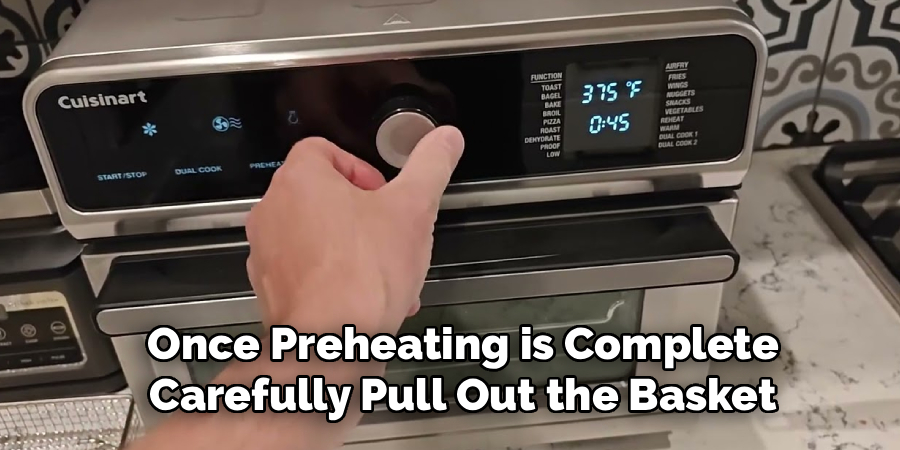 Once Preheating is Complete
Carefully Pull Out the Basket