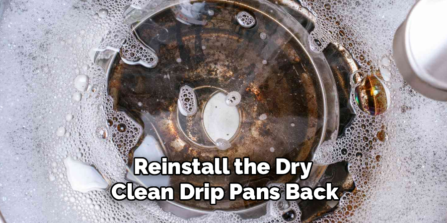 Reinstall the Dry 
Clean Drip Pans Back