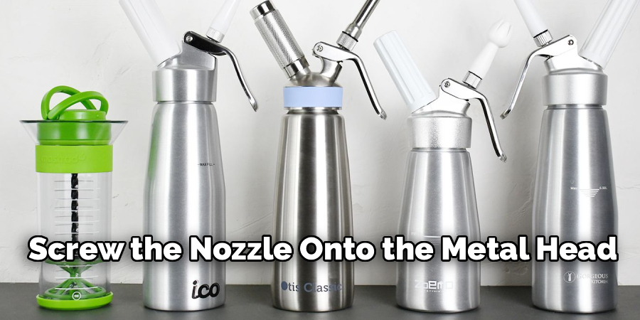 Screw the Nozzle Onto the Metal Head