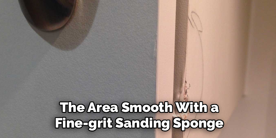The Area Smooth With a Fine-grit Sanding Sponge