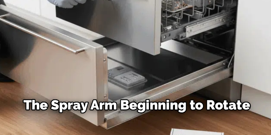 The Spray Arm Beginning to Rotate