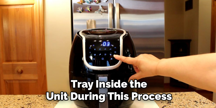 Tray Inside the
Unit During This Process