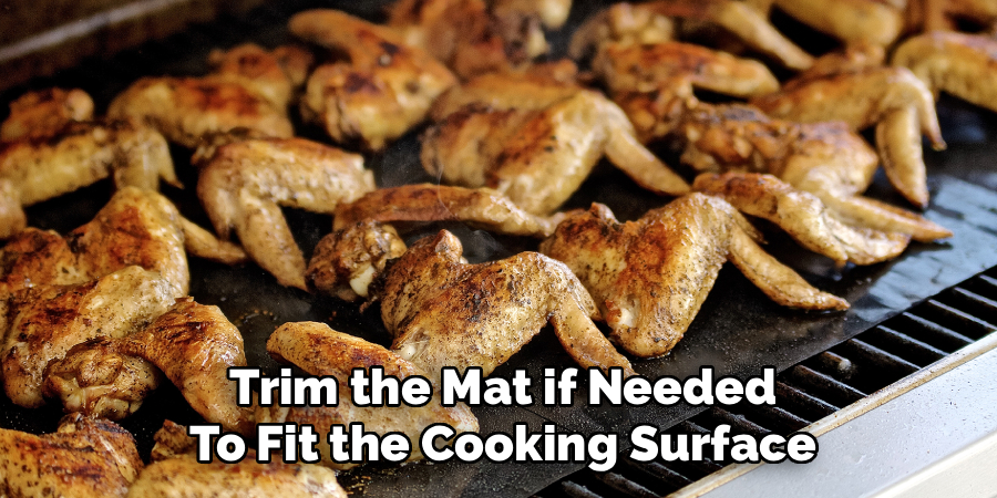 Trim the Mat if Needed To Fit the Cooking Surface
