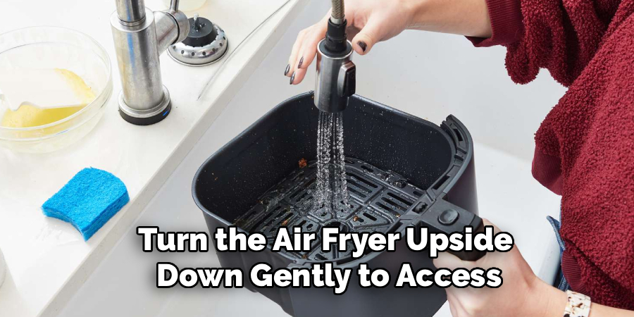 Turn the Air Fryer Upside Down Gently to Access