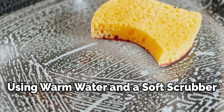 Using Warm Water and a Soft Scrubber